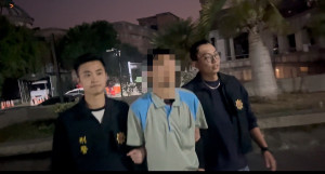 南投警方逮到嫌犯移送地檢署，晚間聲押羅姓男子。（縣警局提供）