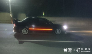 男子酒後駕車卻因不勝酒力，在車道上睡著險象環生，警方依違反公共危險法辦。（記者陳昭宗拍攝）