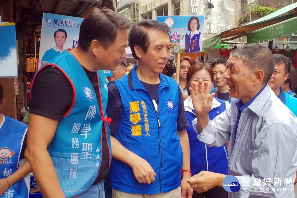 國民黨中央助選團副團長周錫瑋陪同桃園市長候選人陳學聖到埔心市場拜票,民眾反應熱烈。