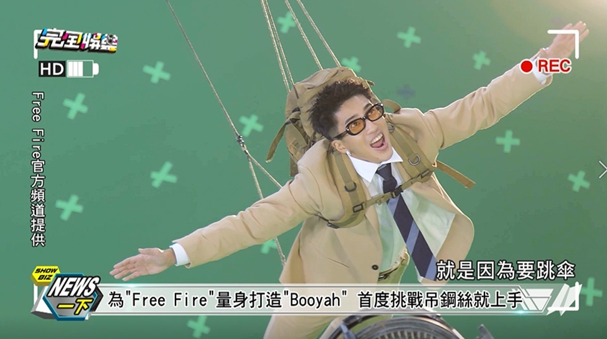 婁峻碩為新歌《Booyah》MV首度跳站吊鋼絲,不僅沒有一絲害怕,還相當享受「被吊」的感覺。(圖/翻攝自YouTube)